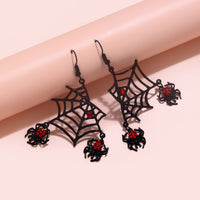 Spider web earrings